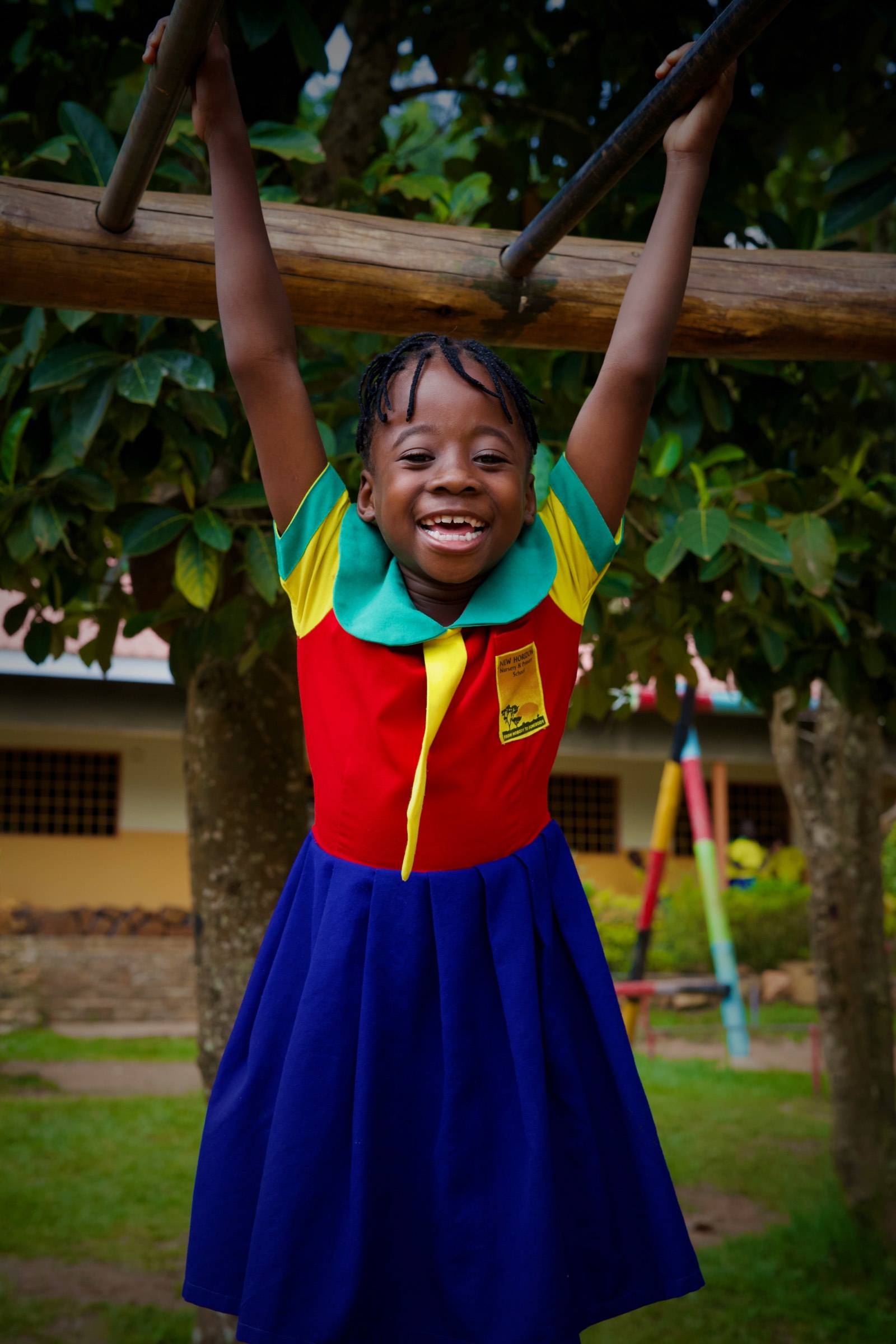 Young girl joyfully playing at school